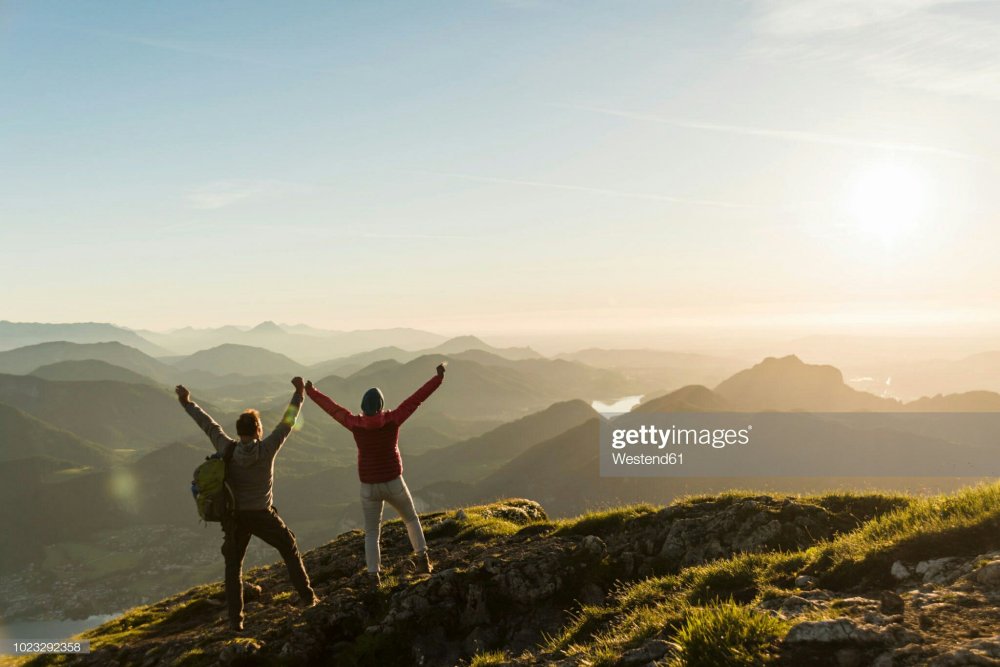 Couple thanking God on Mountain 