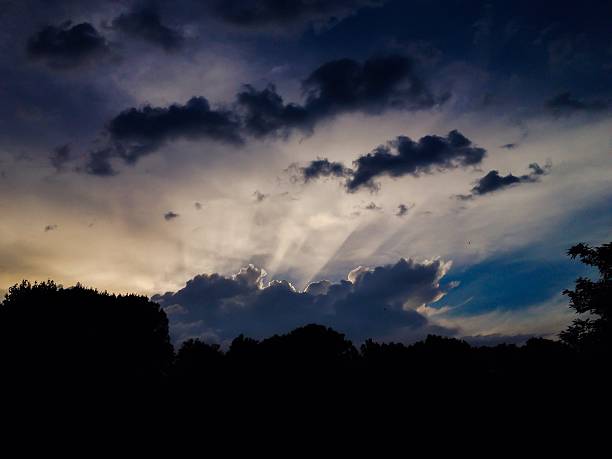 The sun behind the clouds